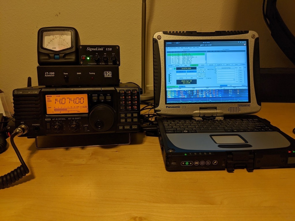 Radio and computer on a desk